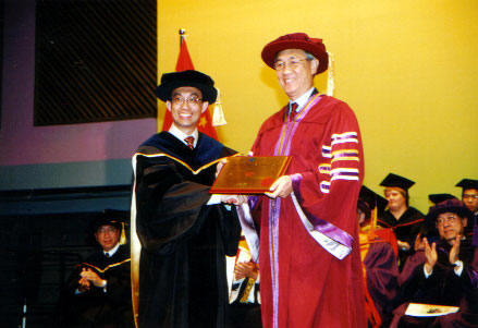 Receiving the Teaching Excellence Award from the President